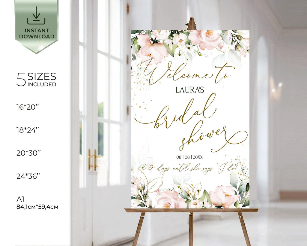 Floral welcome sign for a bridal shower on an easel with text and flower design.