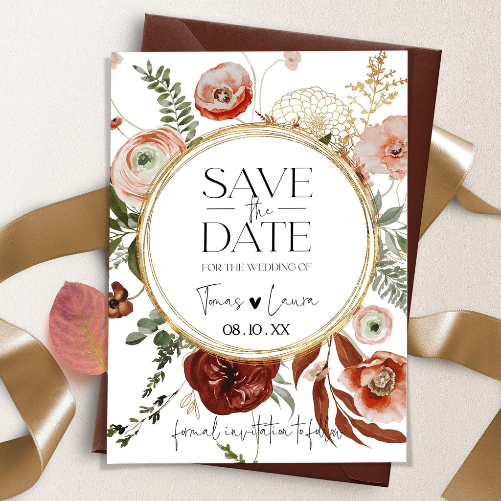 A save the date card with a floral design, featuring terracotta shades and gold accents.