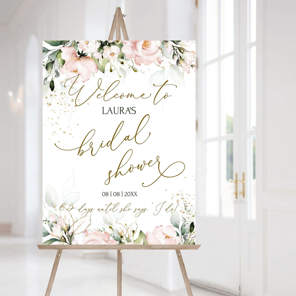 A stand-up bridal shower welcome sign with a floral design and customizable text, displayed in a room with a white background.