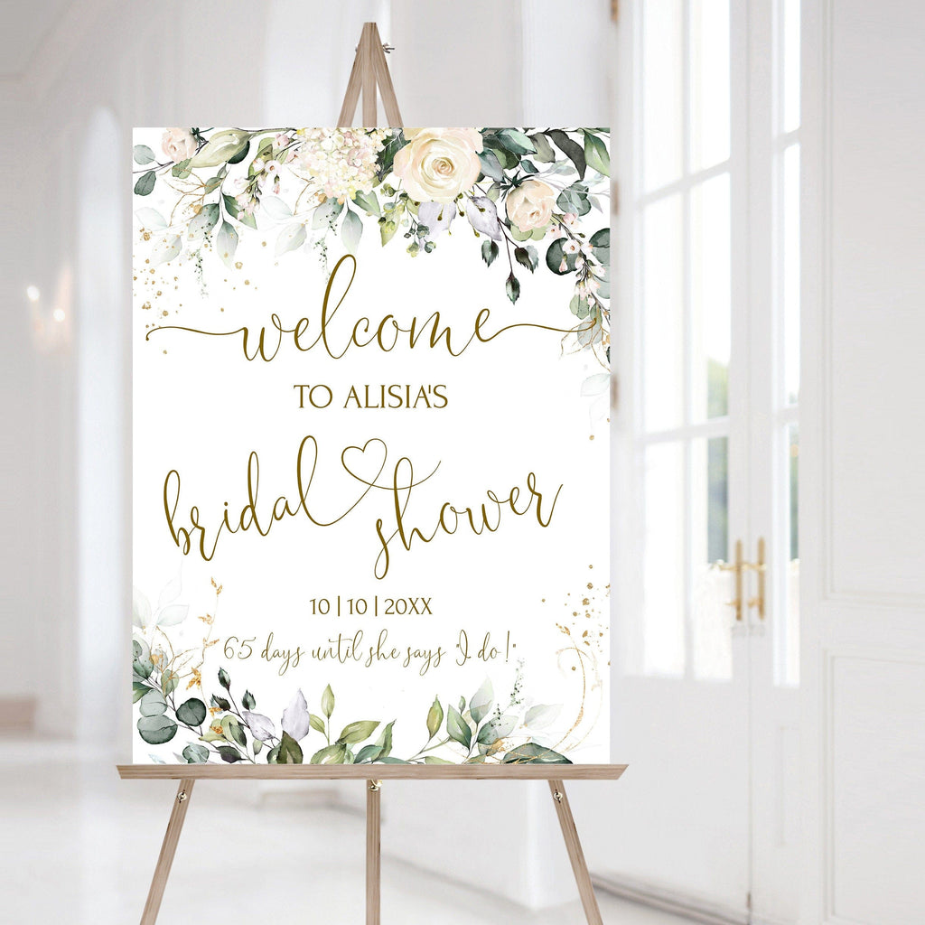 A printable bridal shower welcome sign with a floral design and editable text, displayed on a easel.