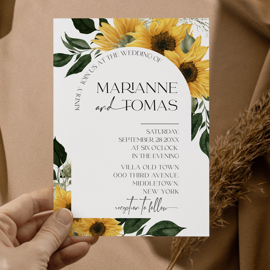A white wedding invitation with a floral border and a central text that reads 'Sunflower' surrounded by sunflower illustrations. The invitation also includes additional details such as the names of the couple, the wedding date, and the location.