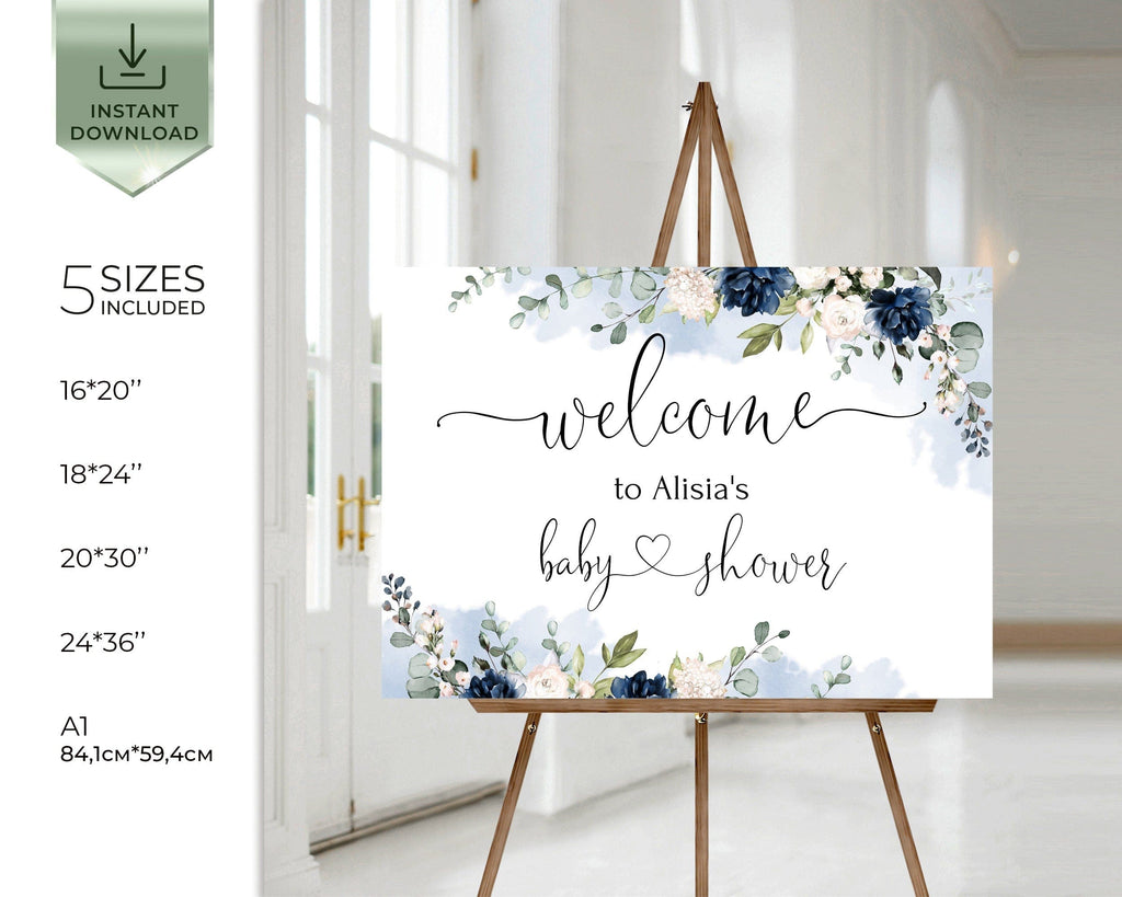 Baby shower welcome sign with floral design on an easel