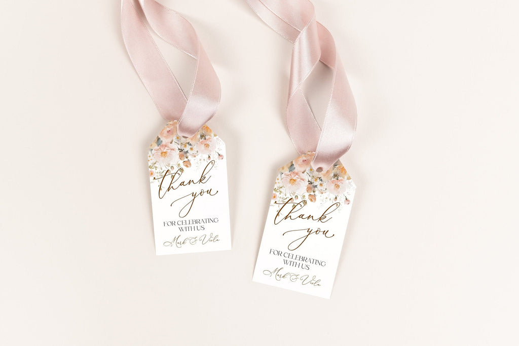 Printable thank you tags with a blush watercolor flowers design and a ribbon attachment.